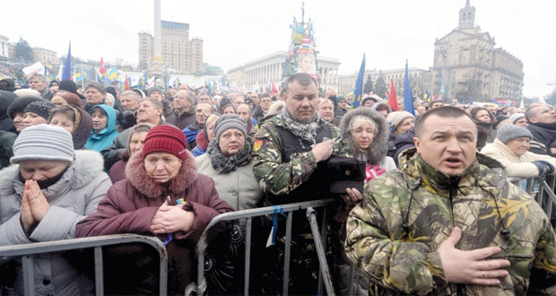  أوكرانيا : المعارضة تخلي بلدية كييف 