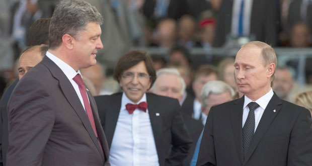 بوتين وبورشنكو يدعوان لإنهاء النزاع في أوكرانيا