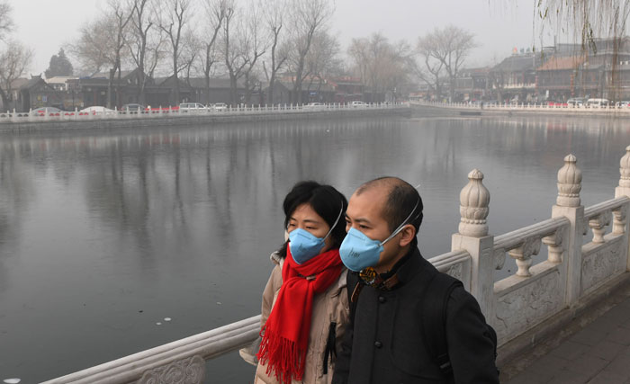 تبدد الدخان الضبابي في بكين وعودة حركة الطيران لطبيعتها