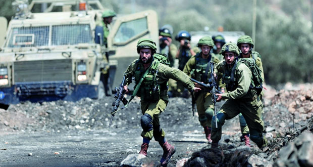 الاحتلال يسقط عشرات الفلسطينيين جرحى في اقتحام عناصره مخيم جنين