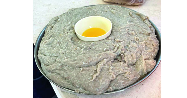 العرسية وجبة شعبية من مظاهر أول أيام العيد
